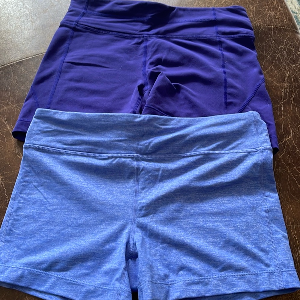 NWOT Atlhleta two purple booty shorts Size M